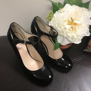 Black patent leather Nine West Heels.